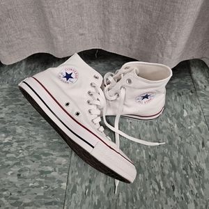 Size 9.5 women's or 7.5 men's white hightop converse